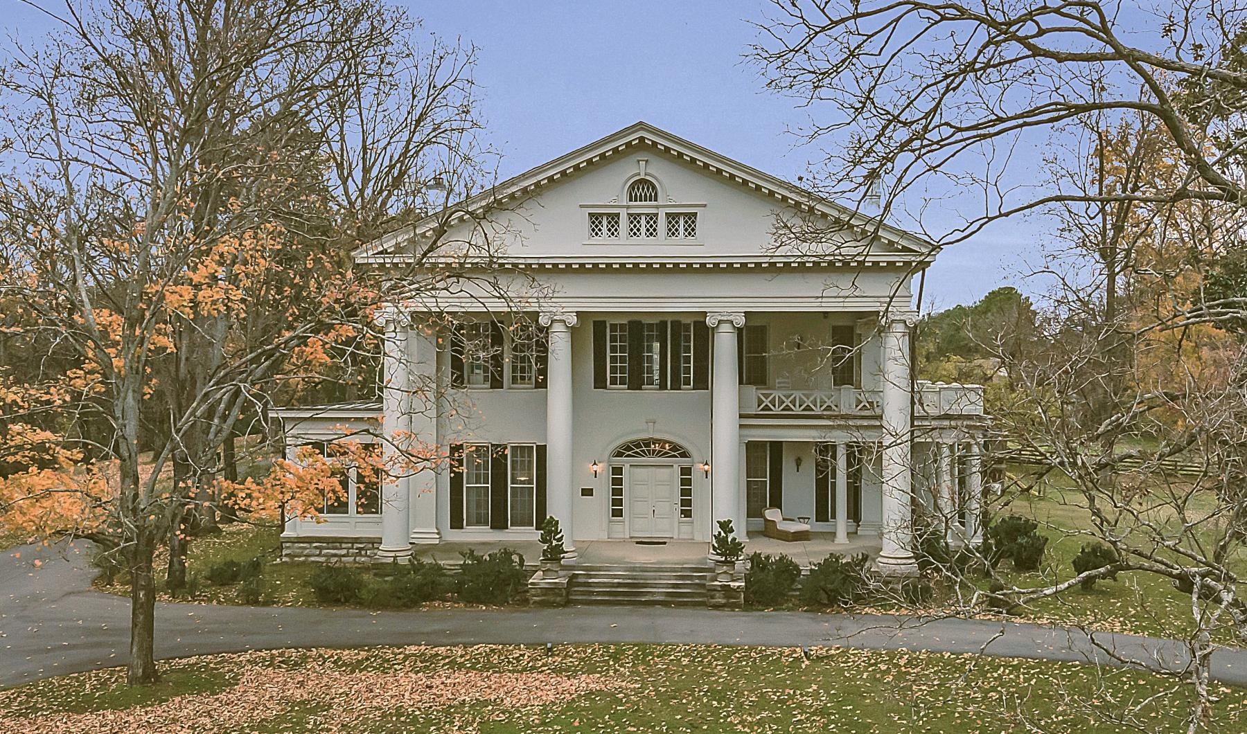 a white house with pillars