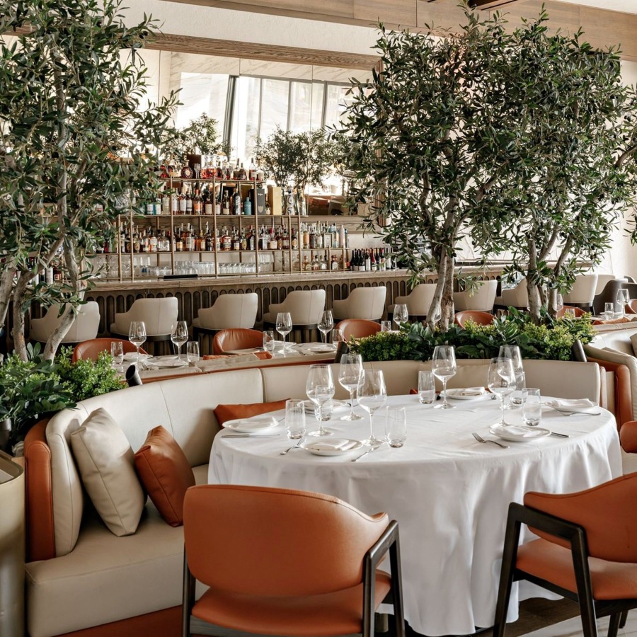 a restaurant with tables and chairs